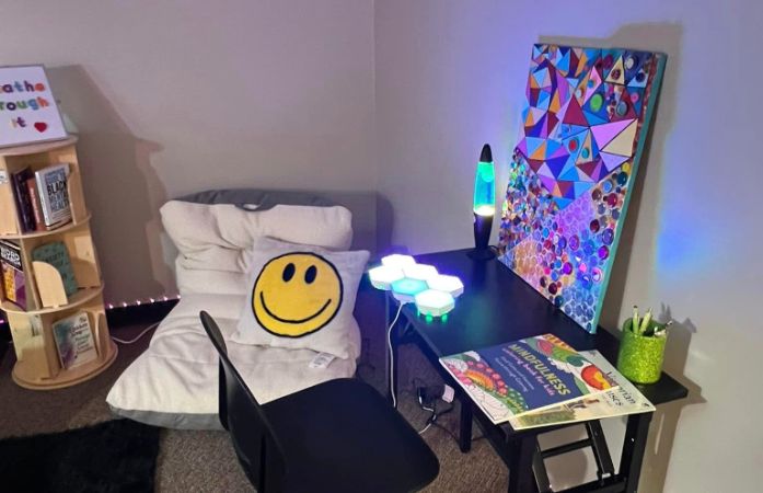 art and mindfullness activity table with a chair and pillow